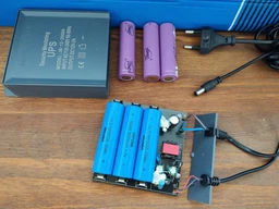 Источник бесперебойного питания для камер и роутеров Jieyang UPS JS-12-2000A (12V/2A) 6000mA фото от покупателей 1