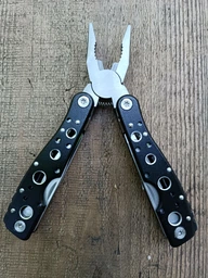 Mультитул Traveler Black Hole MT 9 в 1 мультифункциональный инструмент в чехле фото от покупателей 1