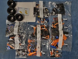 Конструктор LEGO Technic Гоночный автомобиль McLaren Formula 1 1434 детали (42141) фото от покупателей 6