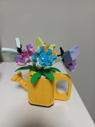 Конструктор LEGO Creator Цветы в лейке 420 деталей (31149) фото от покупателей 1