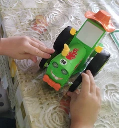Весёлый Трактор на Радиоуправлении Crazy Jumping Car /На пульте управления /Танцующий Синий Трактор фото от покупателей 2