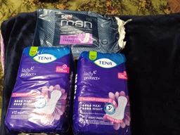 Урологические прокладки Tena Lady Protect Maxi Night женские 12 шт (7322541120966) фото от покупателей 1