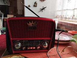 Радіоприймач Golon RX-455S + Bluetooth та сонячною панеллю FM, AM, SW USB/microSD power bank LED-ліхтарик Ретро-дизайн Сірий фото від покупців 9
