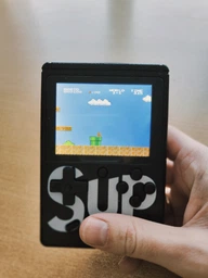Портативна ігрова консоль DENDY PORTABLE 2,8-дюймовый цветной экран + Джойстик фото від покупців 6