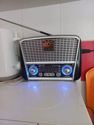 Радіоприймач Golon RX-455S + Bluetooth та сонячною панеллю FM, AM, SW USB/microSD power bank LED-ліхтарик Ретро-дизайн Сірий фото від покупців 7