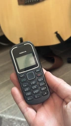 Мобільний телефон кнопковий Nokia 1280 black (140-FMF) фото від покупців 8