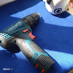 Акумуляторний ударний дриль-шурупокрут Bosch Professional GSB 120-LI + 2 акум. 12V 2.0 Аг + зарядний пристрій+ Набір біт (10 шт. + магнітний тримач) + Набір свердел (12 шт.) (06019G8102)