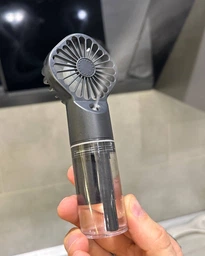 Ручний вентилятор - зволожувач повітря на акумуляторі Humidifying Fan тришвидкісний міні-вентилятор / міні-кондиціонер із розпиленням води, 15.7х6.8 см, рожевий (103945197) фото від покупців 1