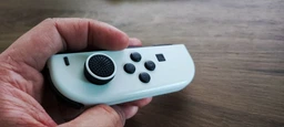 Металевий засув заглушка Joy-Con контролера Nintendo Switch 2 шт фото від покупців 1