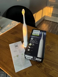 Электрическая зубная щетка Philips Sonicare HX7110/01 серии 5500 фото от покупателей 10