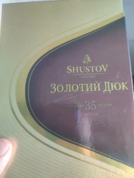 Коньяк Шустов Золотой Дюк 35 0.7 л 40% в подарочной упаковке (4820000947756) фото от покупателей 3