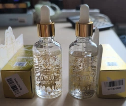 Есенція для обличчя з частинками золота 24к Elizavecca Milky Piggy Hell-Pore Gold Essence 50 мл фото від покупців 2