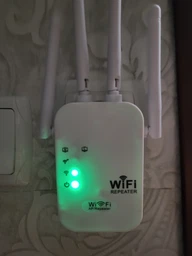 Підсилювач WI-FI сигналу репітер ретранслятор Wireless Repeater білий фото від покупців 1