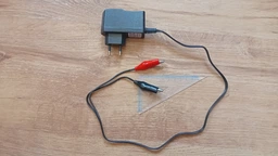 Импульсное зарядное устройство Merlion для аккумуляторов 6V, Ток заряда 7.5V/1A (YT10555)