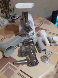 Мясорубка Bosch MFW2517W с насадкой соковыжималкой фото от покупателей 5