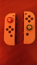 Силиконовые накладки на стики Super Mario (4в1) для Nintendo Switch / Switch OLED / Switch LITE [447689012]