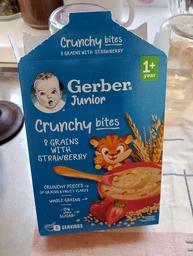 Дитяча каша суха швидкорозчинна Gerber Мультизлакова з хрусткими пластівцями та шматочками полуниці для дітей від 1 року 200 г (8445291220836) фото від покупців 2