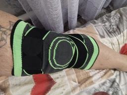 Спортивний бандаж колінного суглоба, наколінник еластичний з фіксувальним ремнем (1шт) SP-Sport ST-2502 (поліамід, спандекс, розмір L, сірий-салатовий) фото від покупців 6