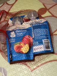 Дитяче пюре Gerber Яблуко та персик 90 г (7613036345460) фото від покупців 6