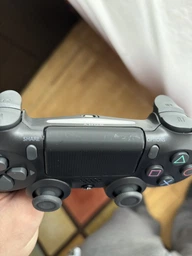 Геймпад беспроводной Sony DualShock 4 Wireless Controller Black для PS4/PC/Смартфона 1000 мА фото от покупателей 9