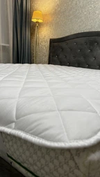 Наматрацник Sleepingg 80х190 см Захисний стьобаний антиалергенний з гумками по кутах, мікрофібра, білий (4820182651663) фото від покупців 14