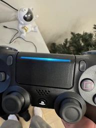 Геймпад беспроводной Sony DualShock 4 Wireless Controller Black для PS4/PC/Смартфона 1000 мА фото от покупателей 6