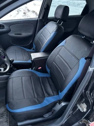 Комплект модельных чехлов NEO X AMI.AUTO из германской экокожи Аригона черно белые на Тойота Ярис (Toyota Yaris) 2005-2010 седан