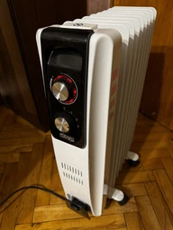 Обігрівач масляний радіаторний 9 секцій DSP 2000Вт, побутовий підлоговий електрообігрівач з колесами, вішалкою для рушників і 3 режимами обігріву для дому, квартири, офісу та дачі Білий, KD-3021