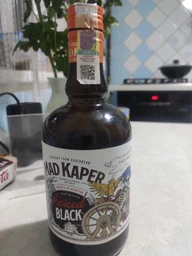 Напиток на основе рома Mad Kaper Rum Black Spiced 0.7 л 35% (5414145034854) фото от покупателей 1