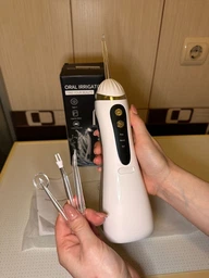 Ирригатор для полости рта 200 мл беспроводной аккумуляторный Oral Irrigator, портативный с 3 режимами работы и 4 сменными насадками для ухода за зубами, деснами и брекетами Белый, RGL-137-White фото от покупателей 10
