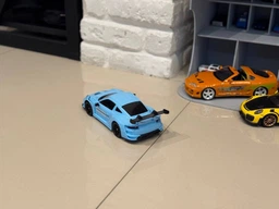 Дрифт машинка кар радиоуправляемая игрушка RC детский автомобиль на пульте управления с USB зарядкой трюковая гоночная скоростная маневренная с светом передними фарами для дома улицы игр дрифтинга бокового скольжения поворотов 360° porsche 1:24 голубой фото от покупателей 1