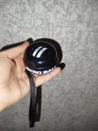 Эспандер кистевой гироскопический гиробол павербол Powerball Gyroball тренажер для кисти запястья предплечья сила хвата антистресс реабилитации после травм координации выносливости вращающийся шар нескользящий корпус спортивный черный фото от покупателей 2