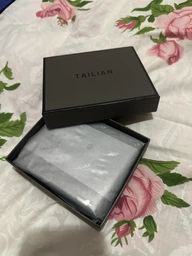 Мужской бумажник из кожи TAILIAN T-120- 197 чор 9см\11см фото от покупателей 4