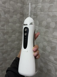 Ирригатор для полости рта 200 мл беспроводной аккумуляторный Oral Irrigator, портативный с 3 режимами работы и 4 сменными насадками для ухода за зубами, деснами и брекетами Белый, RGL-137-White фото от покупателей 3
