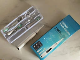 Электрическая ультразвуковая зубная щетка скалер Electric Teeth Cleaner для удаления камней отбеливание зубов белая фото от покупателей 6