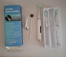 Электрическая ультразвуковая зубная щетка скалер Electric Teeth Cleaner для удаления камней отбеливание зубов белая фото от покупателей 4