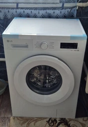 Стиральная машина LG F2Y2NS3WE фронтальная, 6кг, 1200, В, 44см, дисплей, пар, инвертор, белый фото от покупателей 8