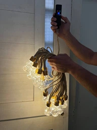 Вуличний та домашній LED світильник+POWER BANK Sunlamp 8 м + 2 м, 20 ламп по 10 LED, 220V, IP65, тепле світло, з пультом і 8 режимами фото від покупців 3