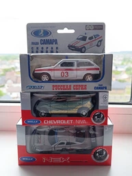 Модель машины 1:34-39 CHEVROLET NIVA trophy Welly 42379TY-W темно-зеленый