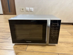 Мікрохвильова піч 25л, 800Вт, дисплей, відкрю ручкою, білий Panasonic 000330015 фото від покупців 10