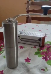 Кавомолка жернова перечниця ручна механічна кавомолки для кавових зерен подрібнення спецій портативна з гострими лезами з нержавіючої сталі фото від покупців 1