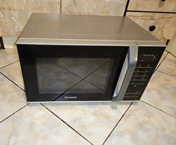 Мікрохвильова піч 25л, 800Вт, дисплей, відкрю ручкою, білий Panasonic 000330015 фото від покупців 3