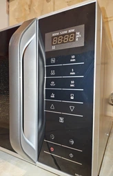 Мікрохвильова піч 25л, 800Вт, дисплей, відкрю ручкою, білий Panasonic 000330015 фото від покупців 2