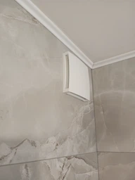 Вытяжной вентилятор Europlast EET125HT с датчиком влажности и таймером белый фото от покупателей 1