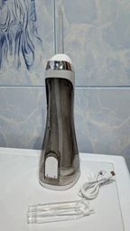 Ирригатор для полости рта 200 мл портативный аккумуляторный с 4 насадками Oral Irrigator, беспроводной с 3 режимами работы для ухода за зубами, деснами и брекетами Синий, AND-1-37-Blue фото от покупателей 6