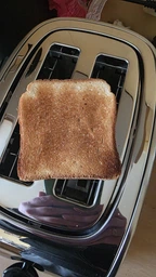Тостер WMF STELIO Toaster / 980 Вт / Серебристый (414010012) фото от покупателей 1