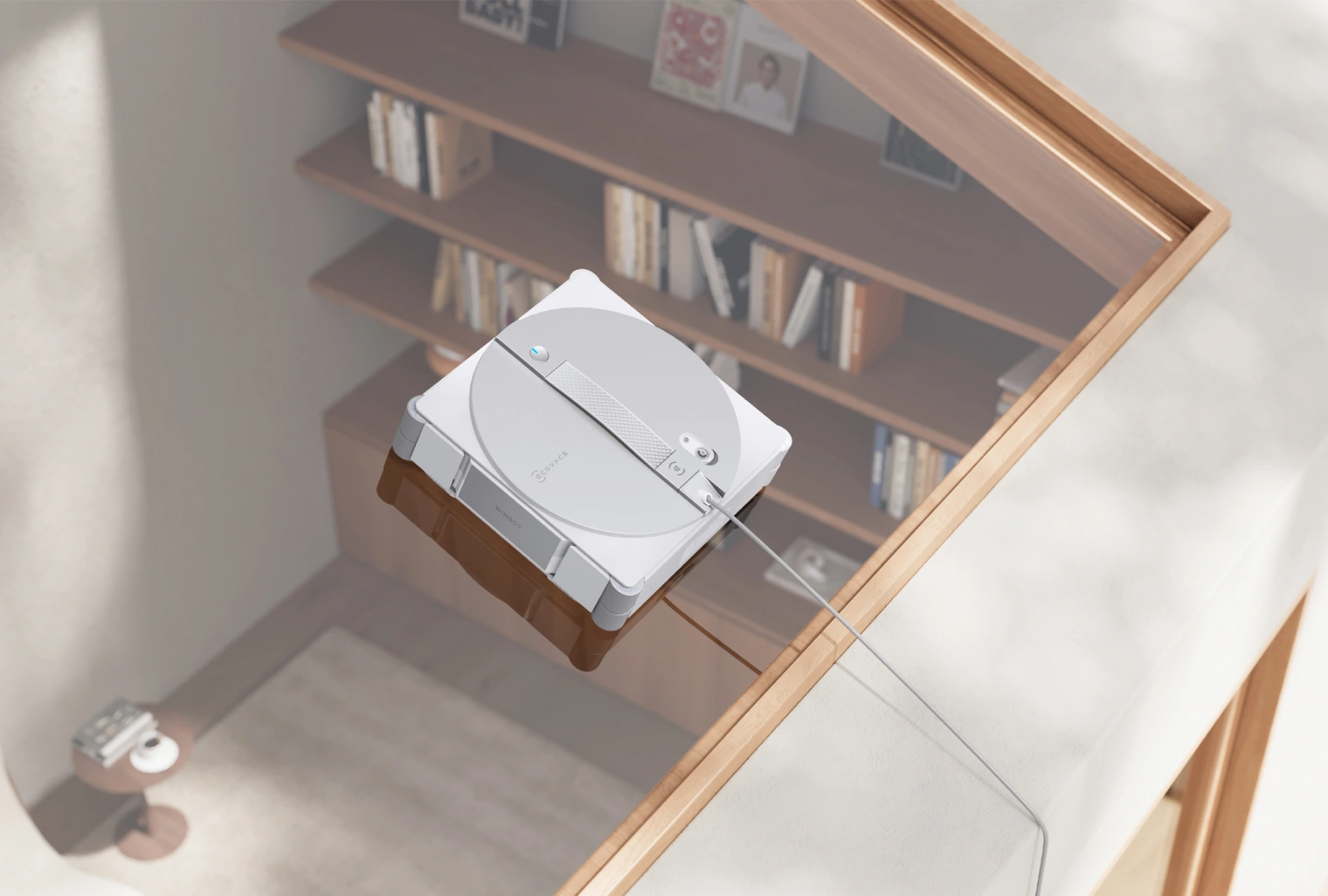 WINBOT W3 OMNI моет окно возле книжной полки