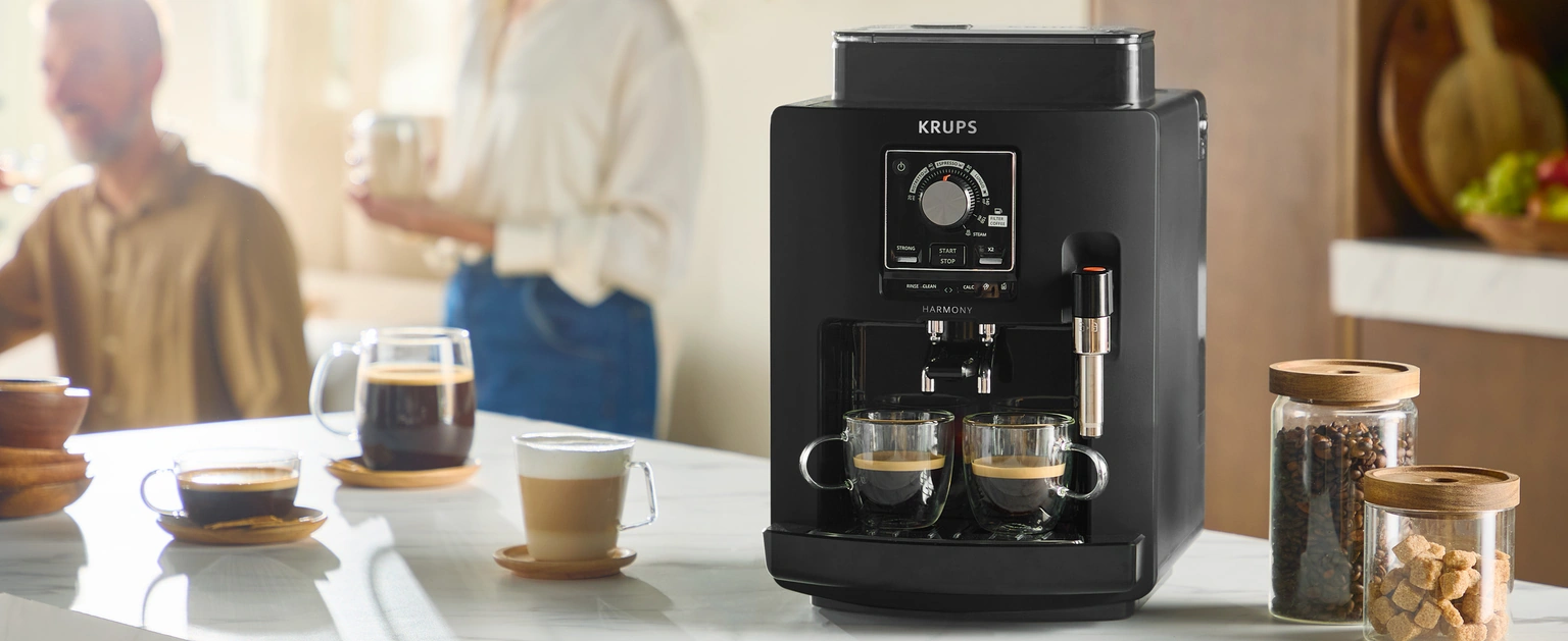 Автоматическая кофемашина Krups Harmony EA5088E0 на кухонной столешнице