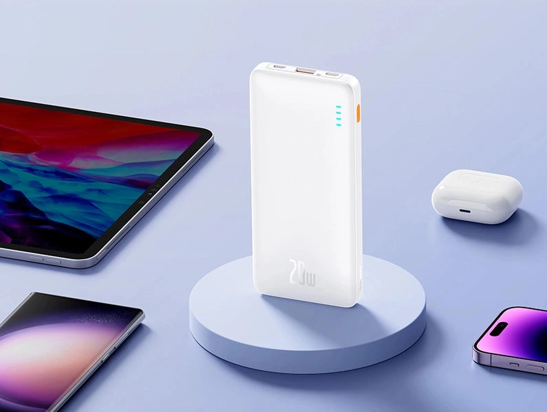 Білий Baseus Airpow поруч із планшетом, смартфоном і навушниками