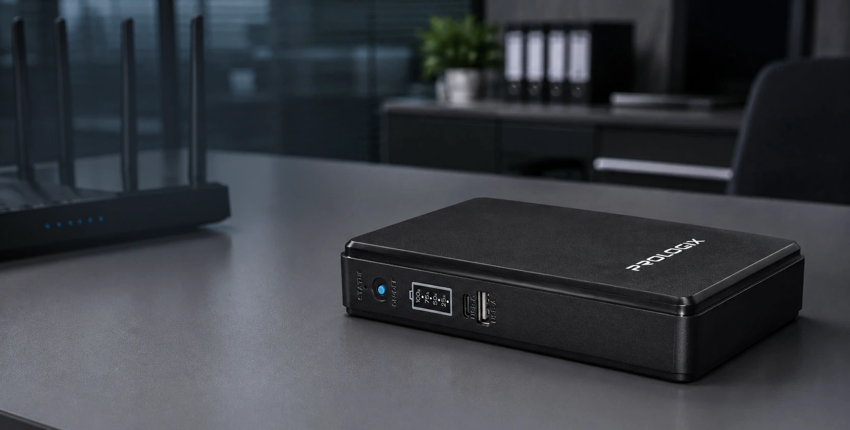 Mini UPS Prologix PLP3660ECO на столе рядом с ноутбуком